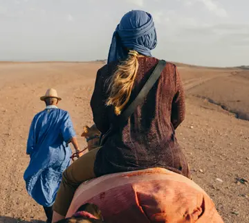 Rider on a camel in the desert