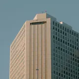 Office tower against a blue sky